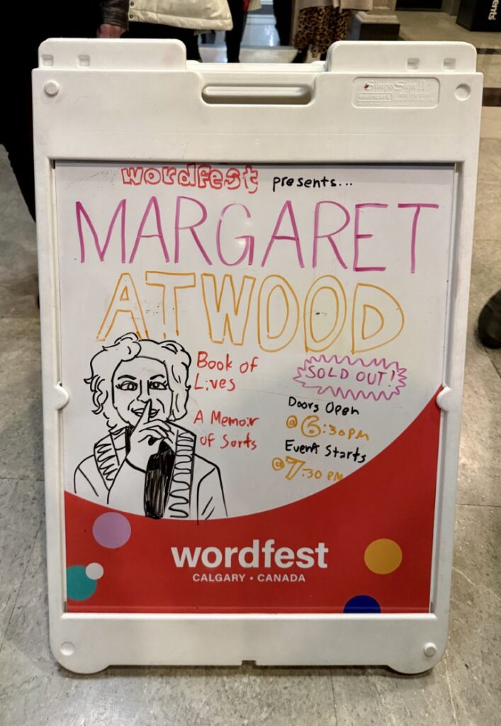 sandwich board poster at entrance 