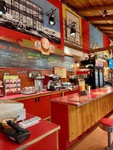 Behind Maggie's counter