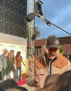 signing autographs